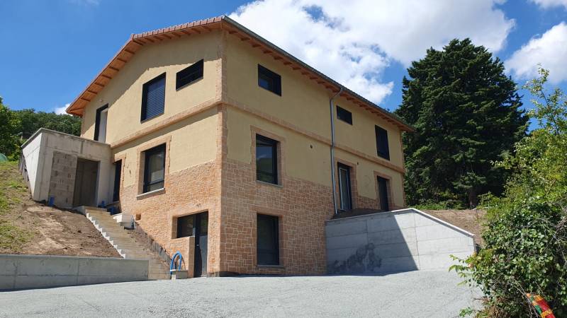 Maison enduite effet pierre